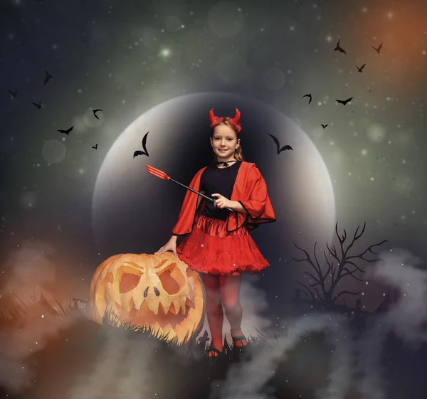 Little devil with jack o lantern — Stock Photo