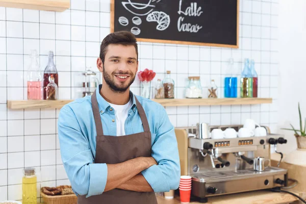 Smiling cafe owner — Stock Photo