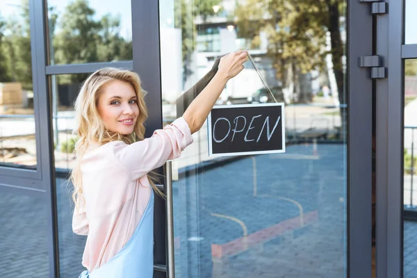 Cafe owner with sign open — Stock Photo