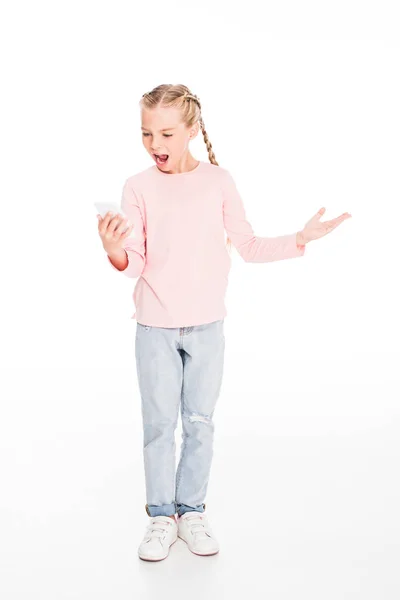 Angry child with smartphone — Stock Photo