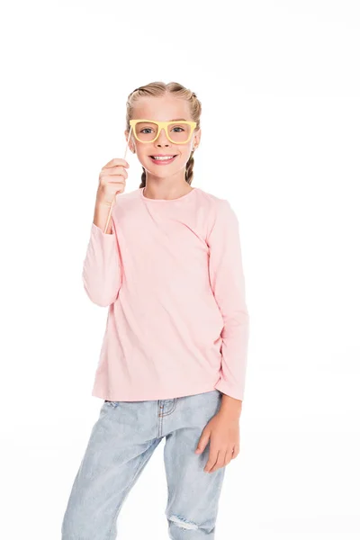 Child with cardboard carnival eyeglasses — Stock Photo