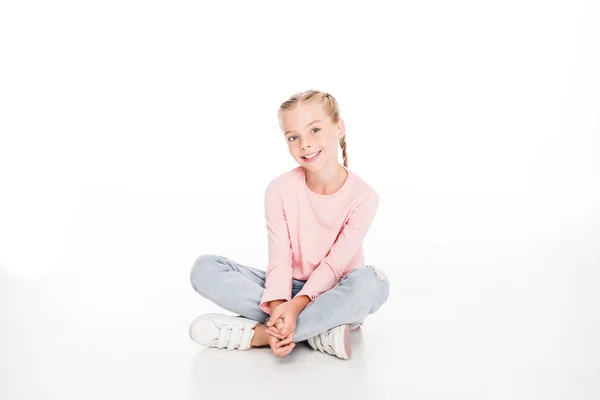 Cheerful child sitting on floor — Stock Photo