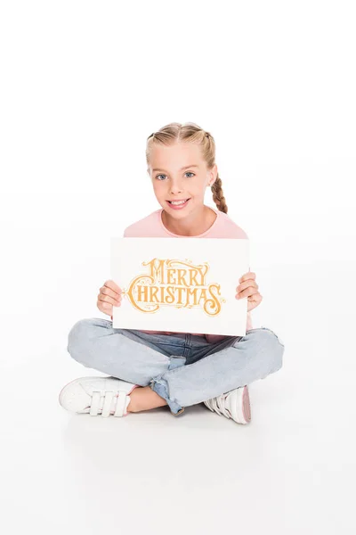 Niño con tarjeta de Feliz Navidad - foto de stock