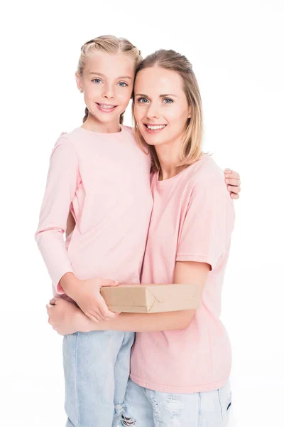 Mother hugging daughter — Stock Photo