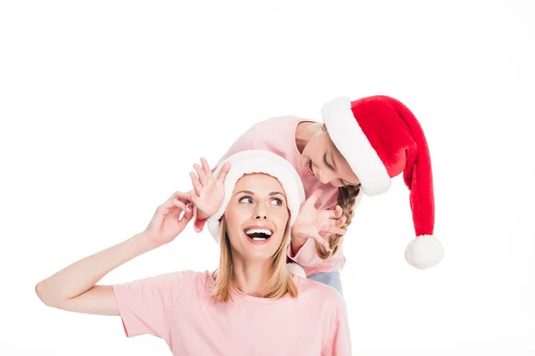 Madre e hija en Navidad - foto de stock