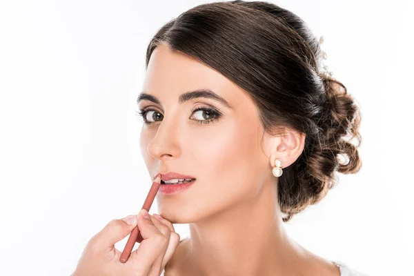 Makeup artist applying makeup — Stock Photo