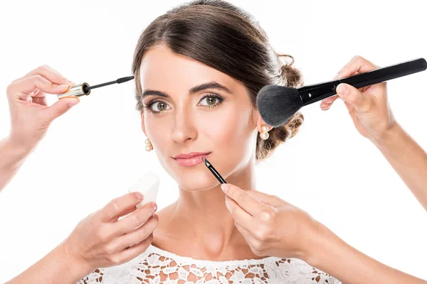 Woman getting makeup — Stock Photo