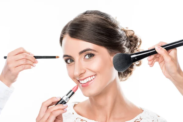 Woman getting makeup — Stock Photo