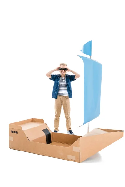 Boy playing with boat — Stock Photo