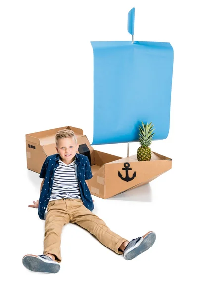 Boy playing with boat — Stock Photo