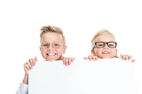 Kids holding blank banner — Stock Photo