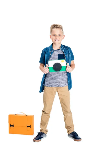 Boy holding camera — Stock Photo