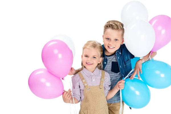 Bambini felici con palloncini — Foto stock