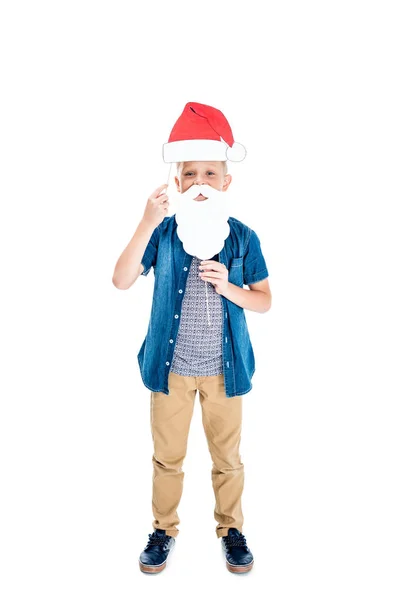 Menino com chapéu de Papai Noel e barba falsa — Fotografia de Stock