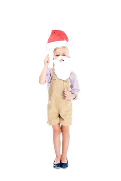 Niño con sombrero de santa y barba falsa - foto de stock