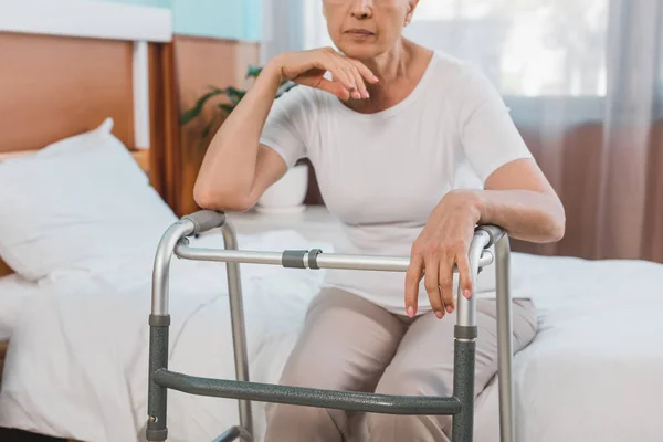 Senior woman with walker in hospital — Stock Photo