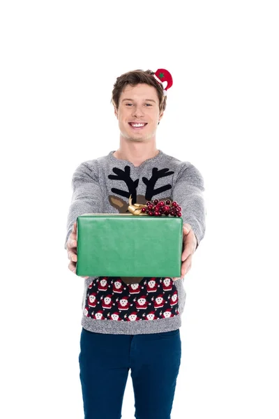 Man with christmas present — Stock Photo