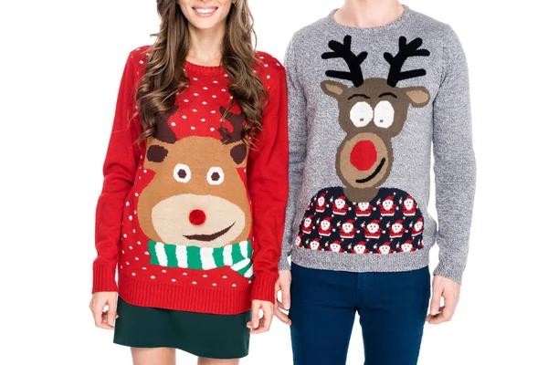 Couple in winter festive sweaters — Stock Photo
