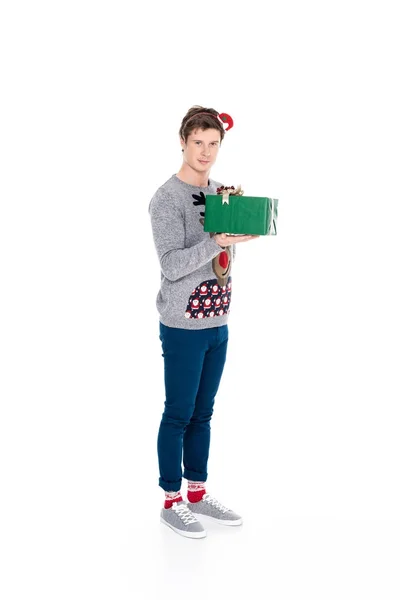 Man with christmas present — Stock Photo