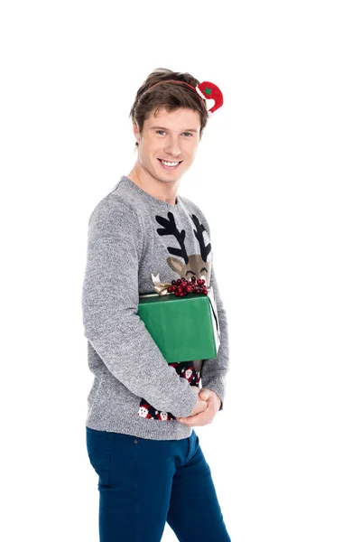 Man with christmas present — Stock Photo