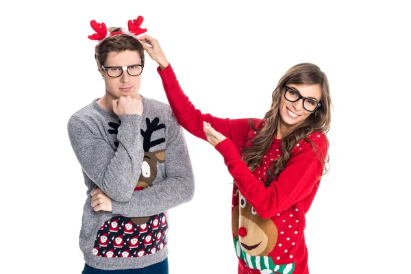 Couple in winter festive sweaters — Stock Photo