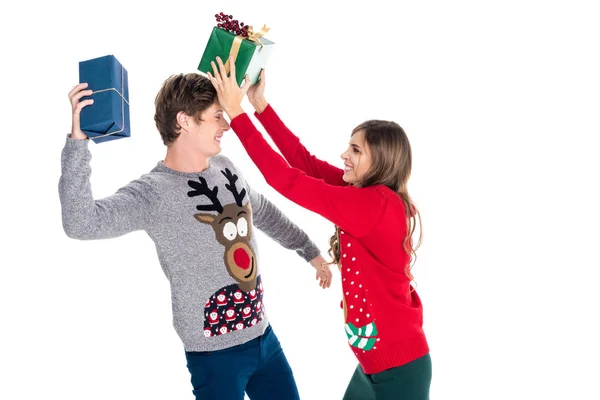 Couple having fun with gifts — Stock Photo