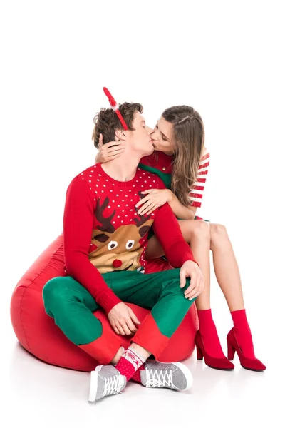 Kissing couple in christmas couple — Stock Photo