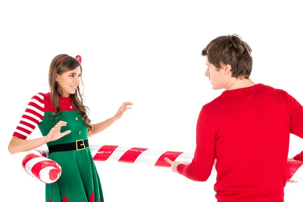 Couple avec bonbons décoratifs de Noël — Photo de stock