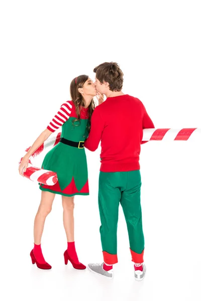 Couple in costumes kissing each other — Stock Photo