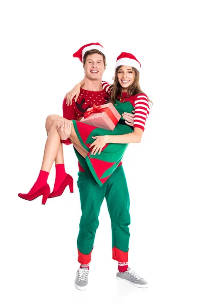 Man holding girlfriend with present — Stock Photo
