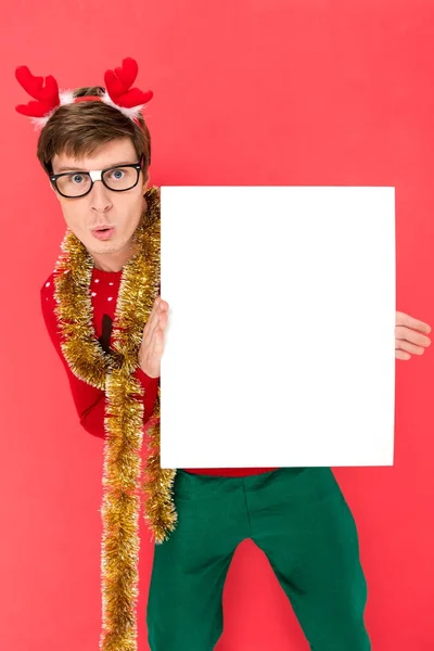 Man in sweater with blank banner — Stock Photo