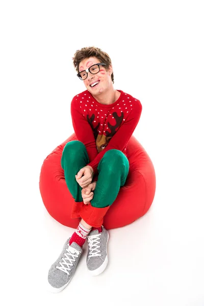 Happy man sitting on bag chair — Stock Photo