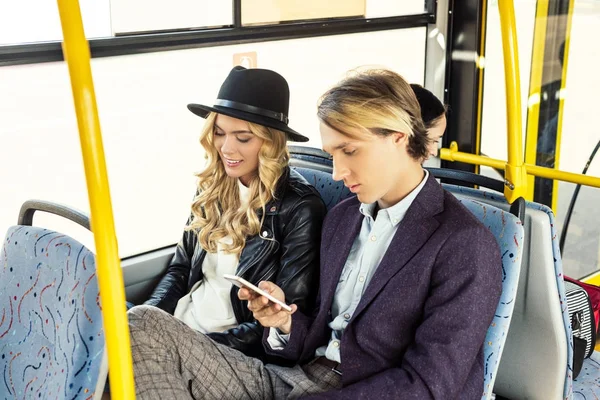 Couple riding in city bus — Stock Photo