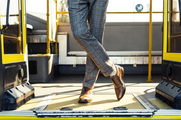 Man standing in city bus — Stock Photo