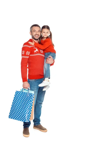 Padre e hija con bolsas de compras - foto de stock