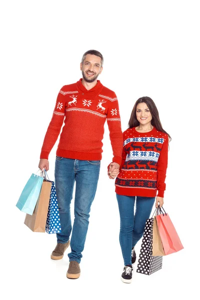 Pareja cogida de la mano en Navidad - foto de stock