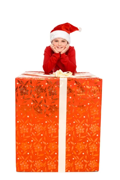 Boy with big christmas present — Stock Photo