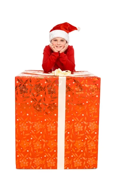 Boy with big christmas present — Stock Photo