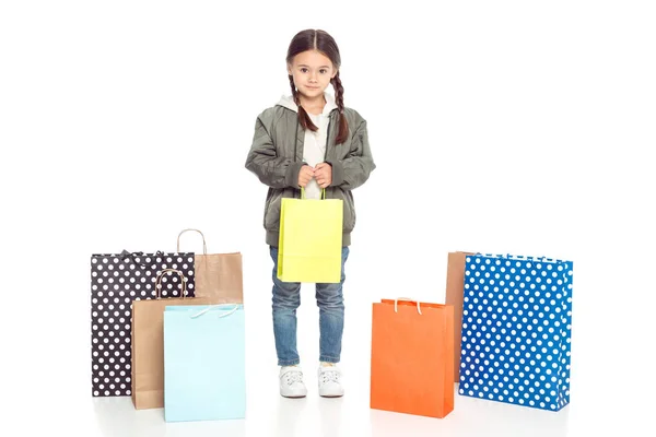 Kid with shopping bags — Stock Photo