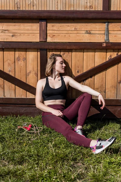 Woman relaxing aftre training — Stock Photo