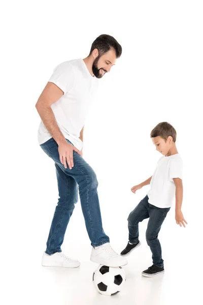 Father and son playing soccer — Stock Photo