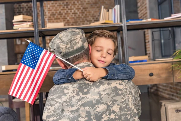 Military father and son embracing — Stock Photo
