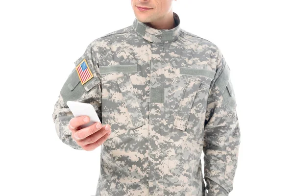 Soldier using smartphone — Stock Photo