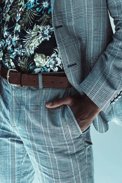 Man in suit with hand in pocket — Stock Photo