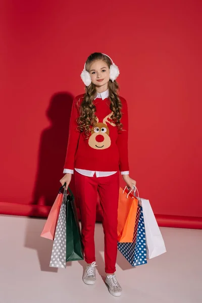 Stylish girl with shopping bags — Stock Photo