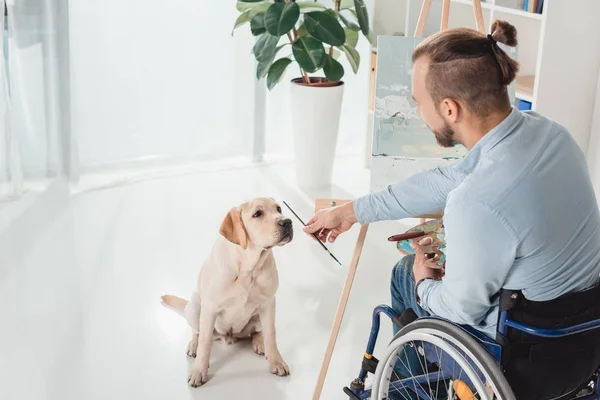 Disabled man painting — Stock Photo