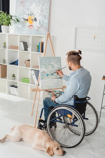 Disabled man painting — Stock Photo