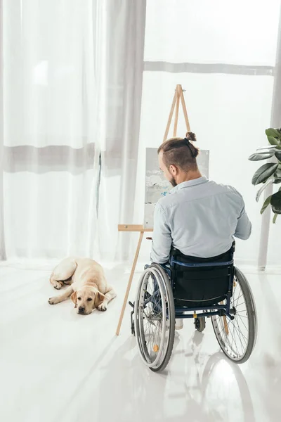 Disabled man painting — Stock Photo