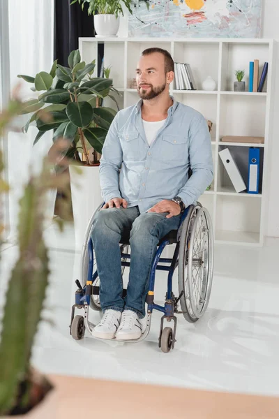 Disabled man on wheelchair — Stock Photo