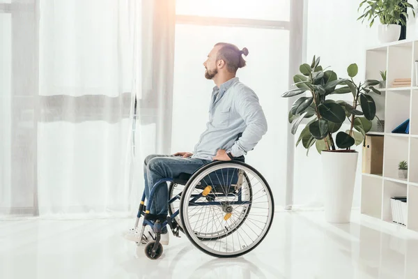 Disabled man on wheelchair — Stock Photo